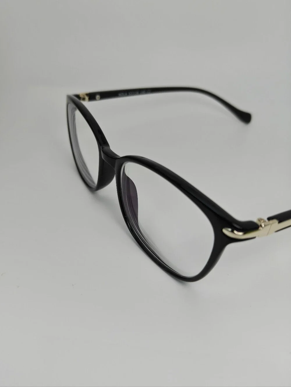 Nola. Classic Black Women's Eyeglass Frames. Gold Shield At Temple Corners.